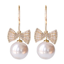 Load image into Gallery viewer, Bow Tie Pearl Statement Earrings
